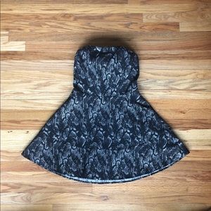 Black dress with gold snakeskin pattern